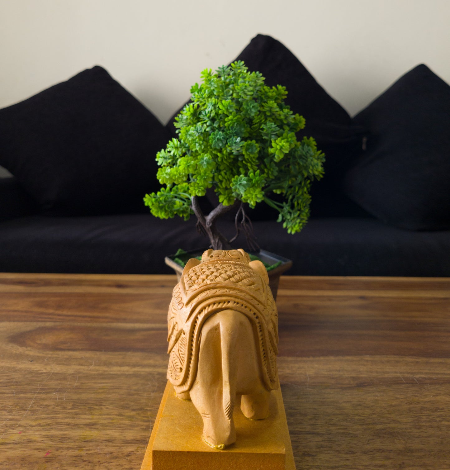 Hand-Carved Wooden Elephant on a Solid Base