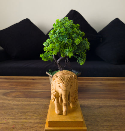 Hand-Carved Wooden Elephant on a Solid Base