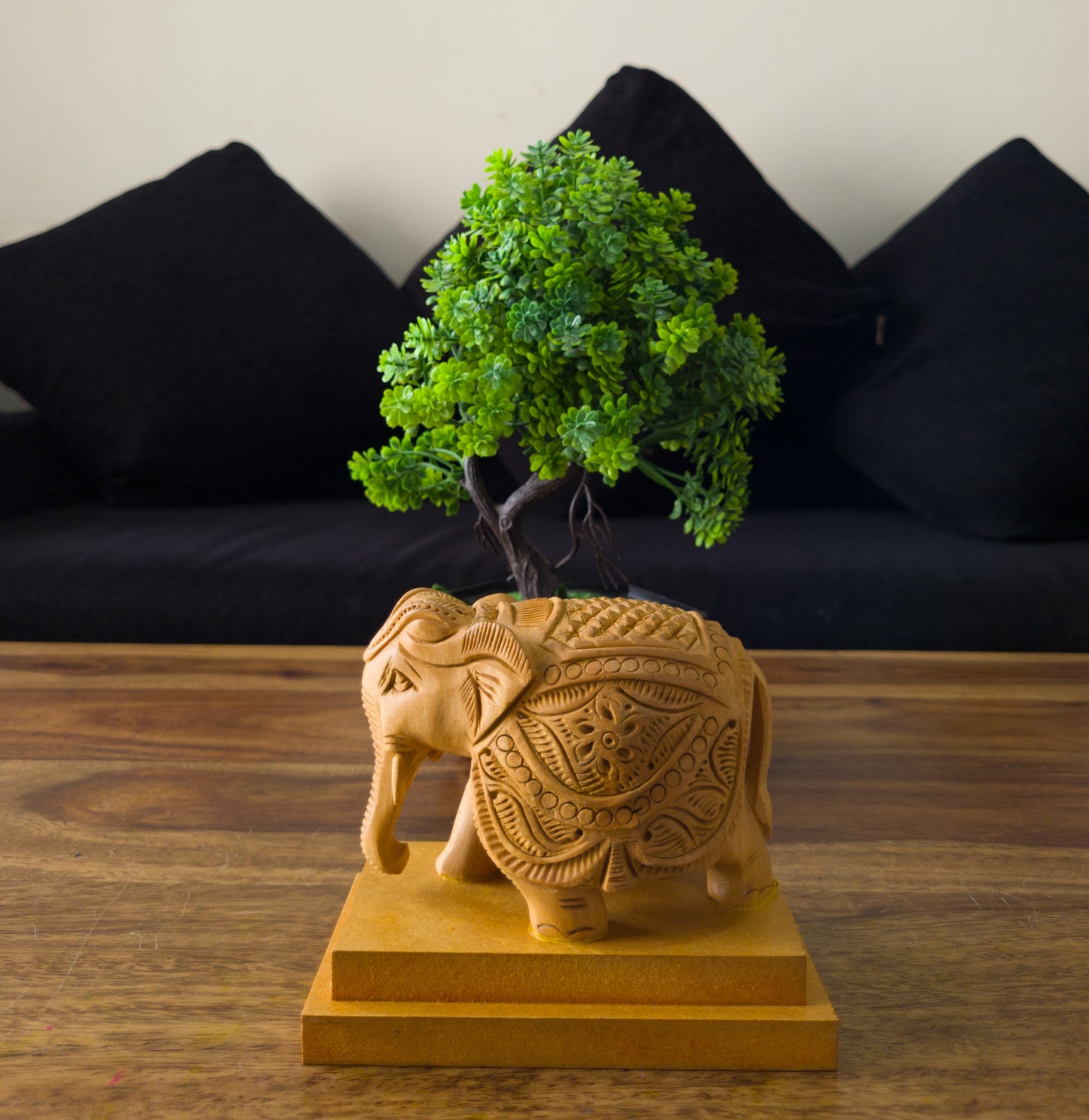 Hand-Carved Wooden Elephant on a Solid Base