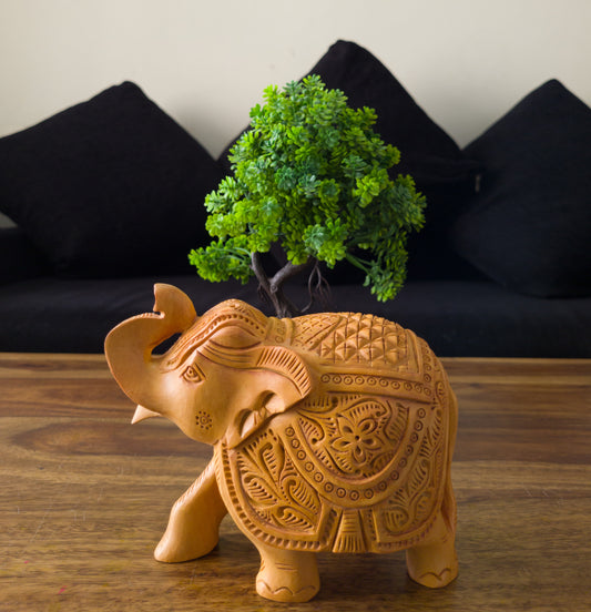 Hand-Carved Wooden Elephant with Ornamental Motifs