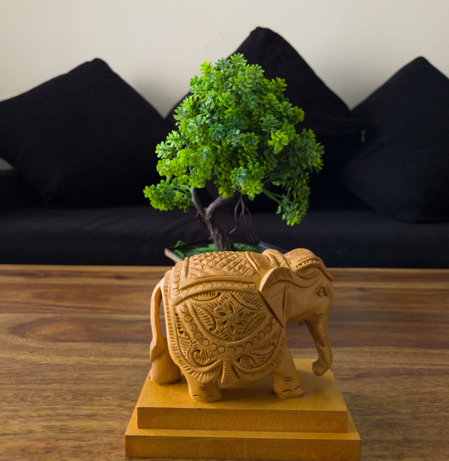 Hand-Carved Wooden Elephant on a Solid Base